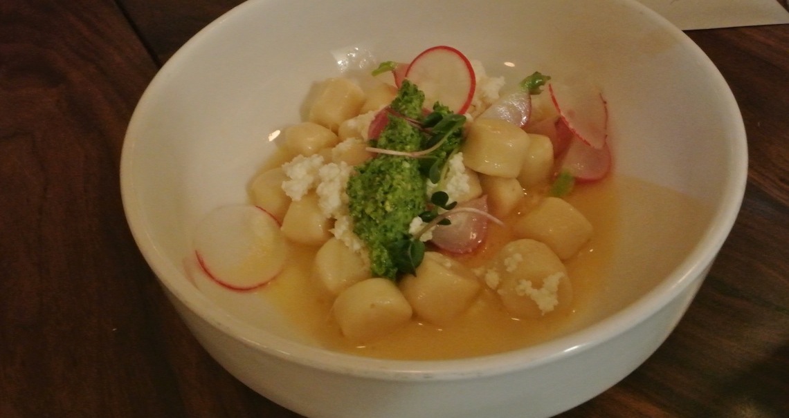 Parisienne gnocchi, radishes, radish green pistou, buttermilk ricotta.