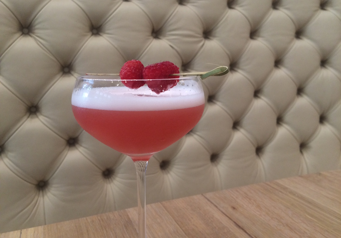 The Cypress Cocktail (Non-Spirited) with Mountain Berry Tea, Lemon, Honey, Egg whites and Raspberries.