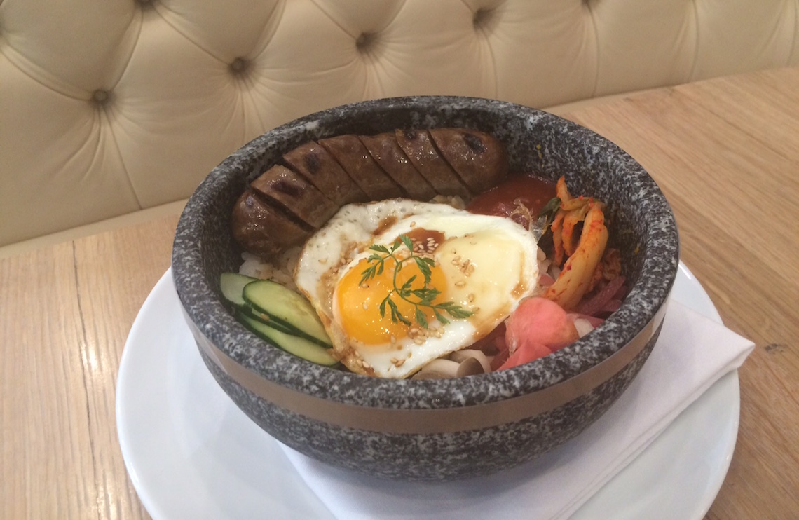 Korean Rice Bowl ($22) with Snake River Farm Wagyu Galbi Sauage, Kimchi, Free-Range Sunny Side Up Eggs, Sesame Dressing.