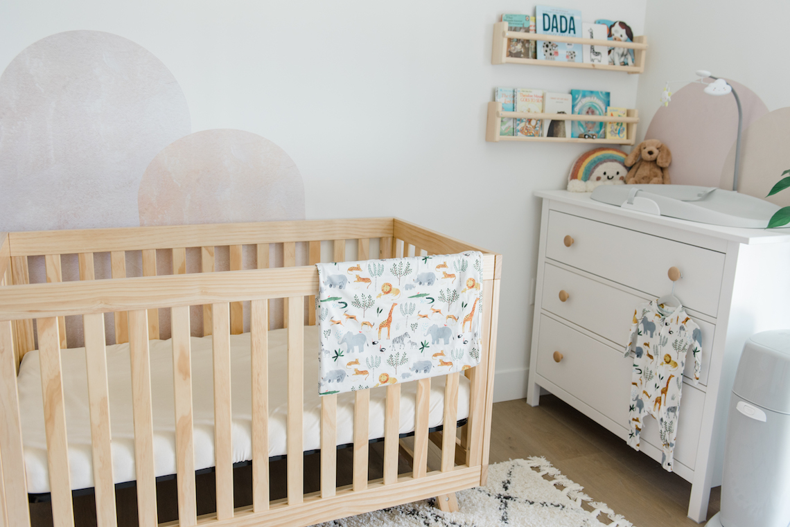 soft grey, white, and natural wood nursery