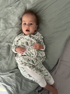 Nest Design sleep suit in Eric Carle Herb Garden design