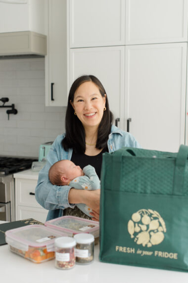 mom with newborn and fresh in your fridge post partum meal delivery bag